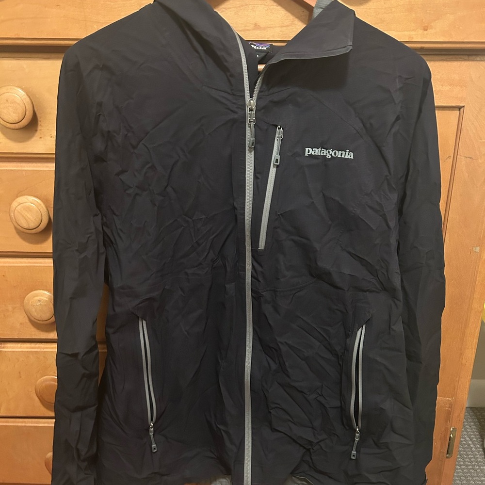 Patagonia Women’s Black Waterproof shell with waterproof zippers & pit zips